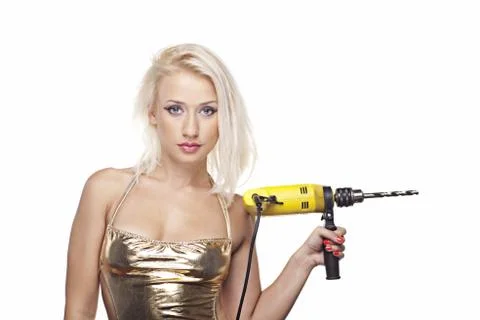 Blonde model with a power drill Stock Photos