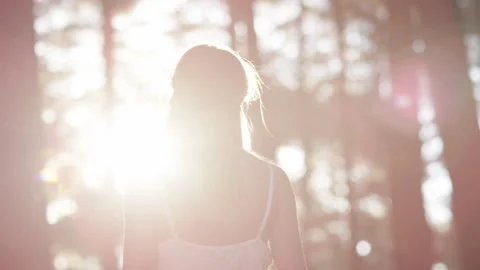 Blonde model walking in bright forest Stock Footage 264011490