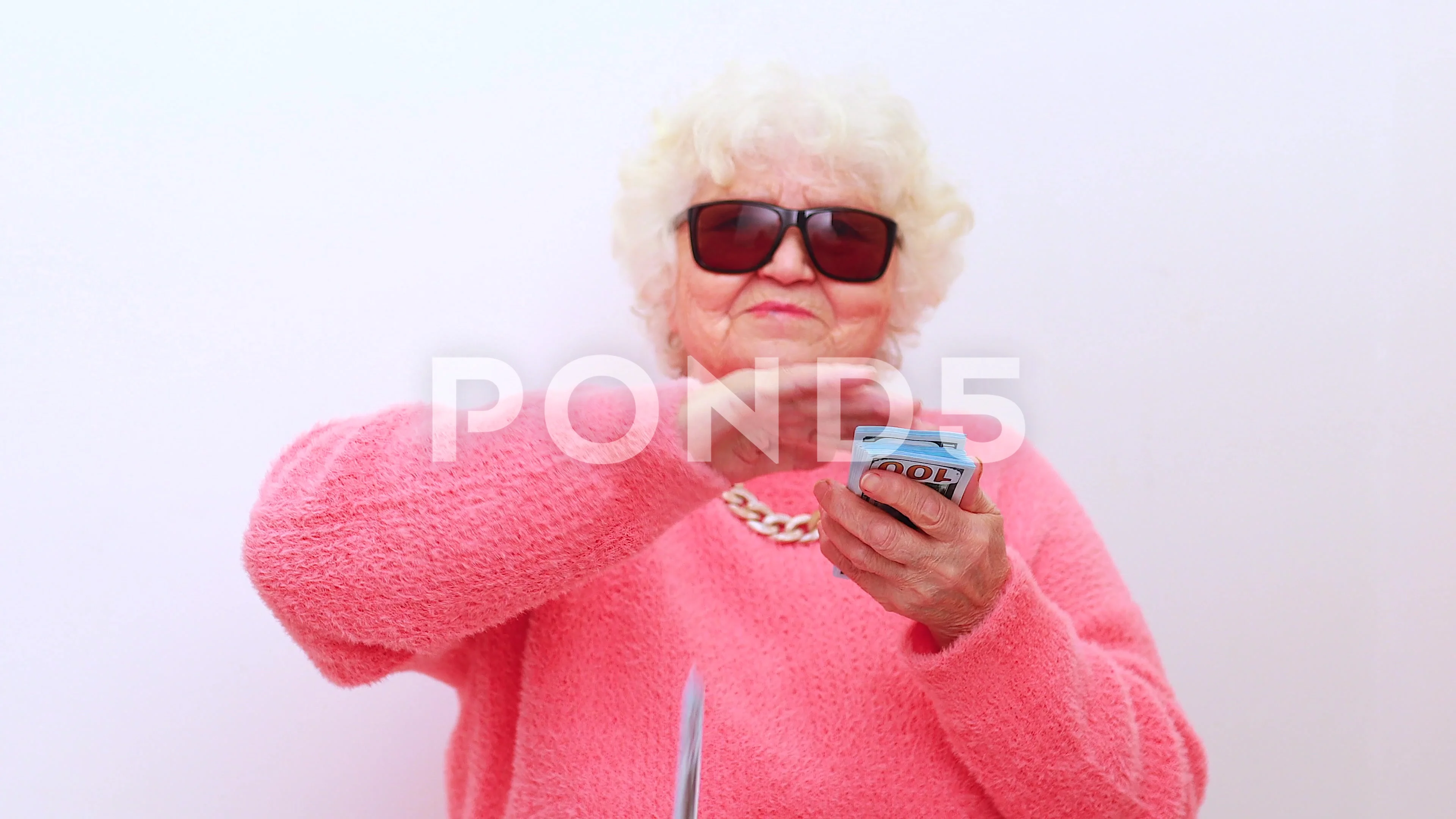 Photo of retired old lady in casual t-shirt sunglasses talking on the phone  cropped view 25700336 Stock Photo at Vecteezy