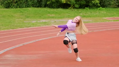 Blonde in short shorts dancing twerk at | Stock Video | Pond5