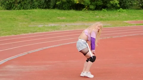 Blonde in short shorts dancing twerk at | Stock Video | Pond5