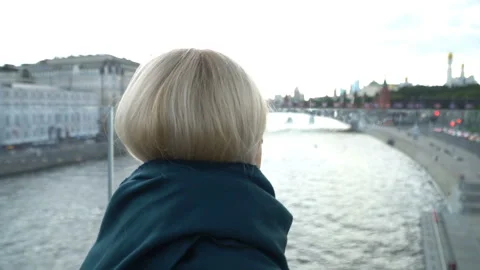 Blonde Standing By The River Stock Footage 90968530