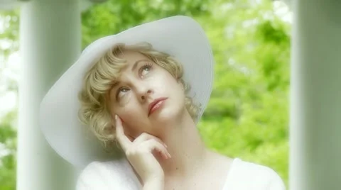 Blonde in Summer Hat Stock Footage 22774241
