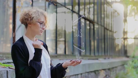 Blonde uses hologram BaaS Stock Footage 166129185