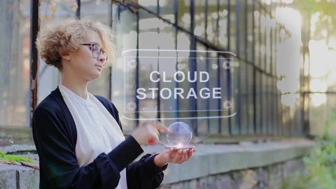 Blonde uses hologram Cloud storage Stock Footage 117349574