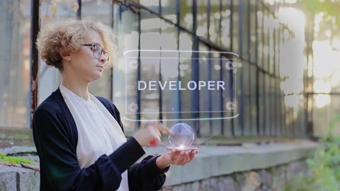 Blonde uses hologram Developer Stock Footage 117042599