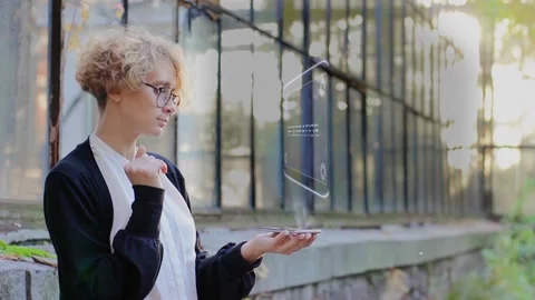 Blonde uses hologram Integration Stock-Footage 158091248