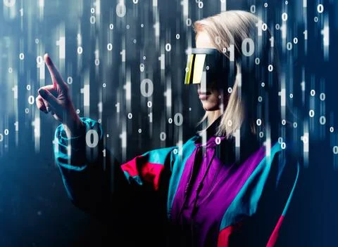 Blonde in VR glasses with binary code around Stockfoto's