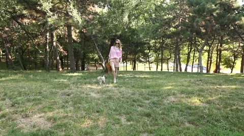 Blonde w Dog Stock-Footage 8555524