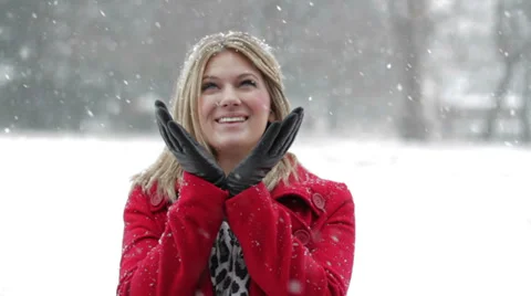 Blonde watching snow Stock Footage 34627873