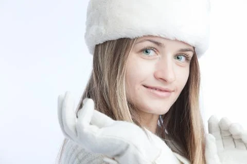 Blonde in the winter hat Stock Photos