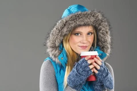 Blonde Winter Model Drinking Beverage Stock Photos