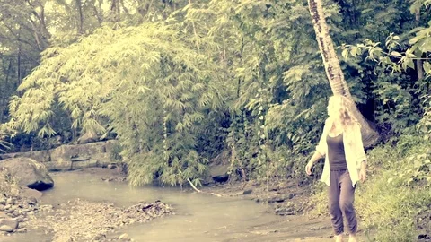 Blonde woman is lost in Java Stock-Footage 75464141