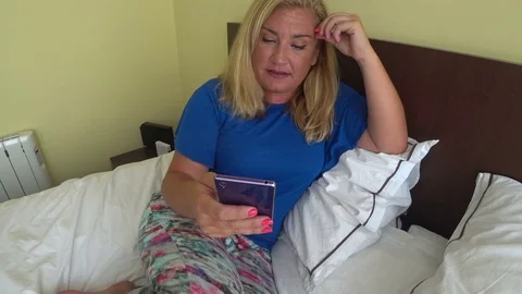 Blonde woman with smartphone 3 Stock Footage