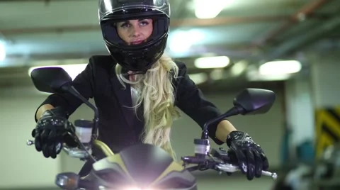 blonde woman taking off gloves and Stock Video Pond5