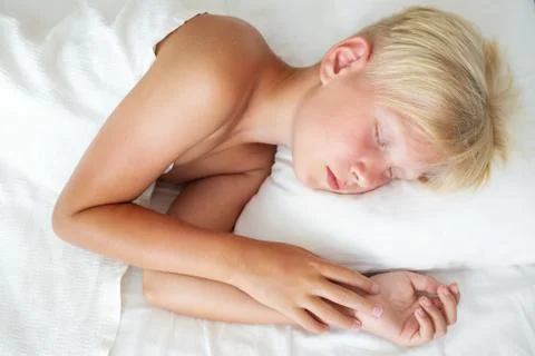 Blondy boy sleeping. Stock Photos