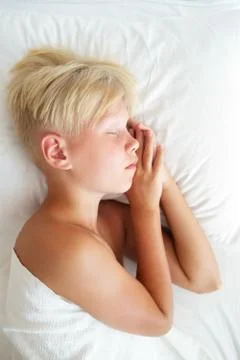 Blondy boy sleeping. Stock Photos