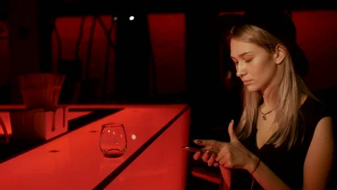 Blone girl is texting message Stock Footage 85599364