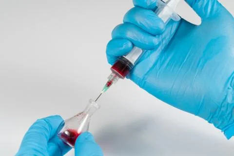 Blood analysis, Doctor with syringe Stock Photos
