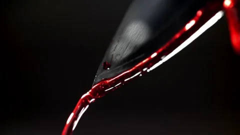 Blood Drip Falling from a Sharp Metallic Kitchen Knife Against Dark Background 库存影片 331101706