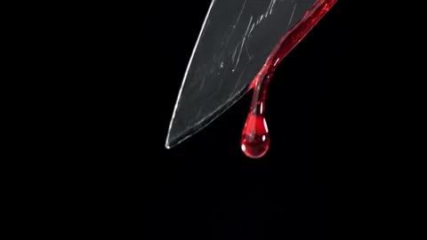 Blood Drip Falling Slowly from a Sharp Metal Knife Blade on Black Background Vídeos de archivo 331101856