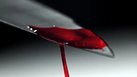 Blood Drip on a Sharp Steel Knife Blade Close Up View Stock Footage 331101816