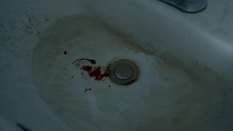 Blood dripping into abandoned sink Stock Footage 103062296
