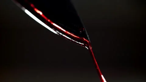 Blood Dripping from a Sharp Metal Blade on a Dark Background Vidéo 331101648