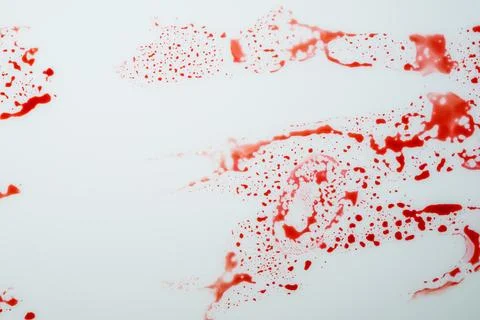 Blood drips on white surface Stock Photos