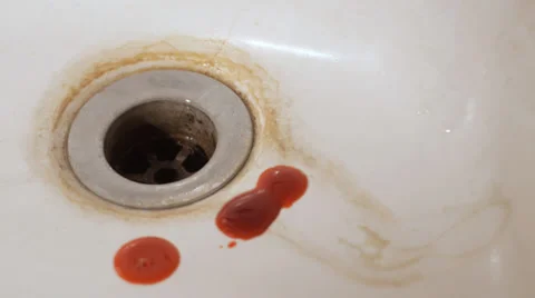 Blood drops in dirty sink Stock Footage 33849385