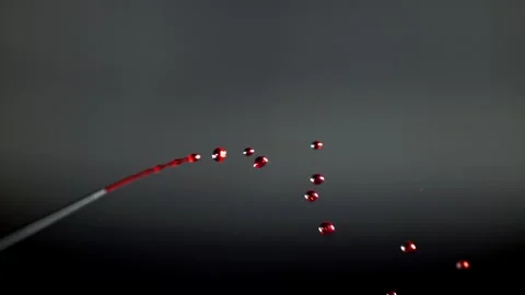 Blood Drops Falling from a Sharp Needle into a Laboratory Environment 库存影片 331101660