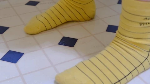 Blood Drops on Floor Between Stockinged Feet Stock Footage 119026023