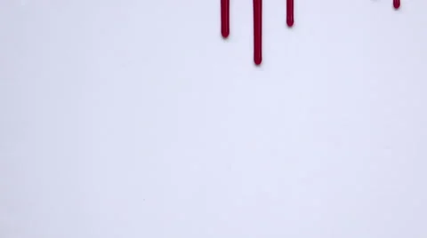 Blood flowing vertically on a white background Stock Footage 54956052