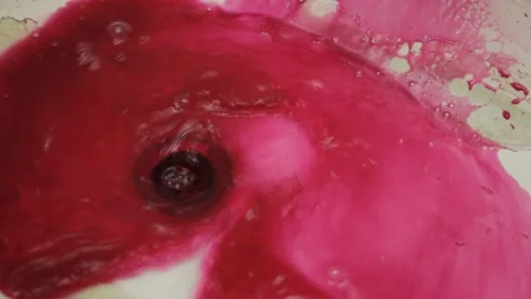 Blood flows into the hole of the shell Video stock 106478743