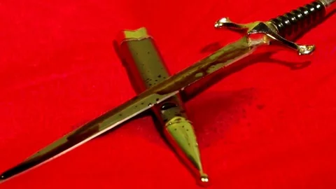 Blood flows through the dagger Stock Footage 73447053