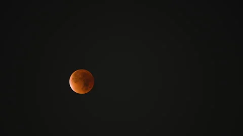 Blood Moon Lunar Eclipse in Night Sky Stock Footage 332945386