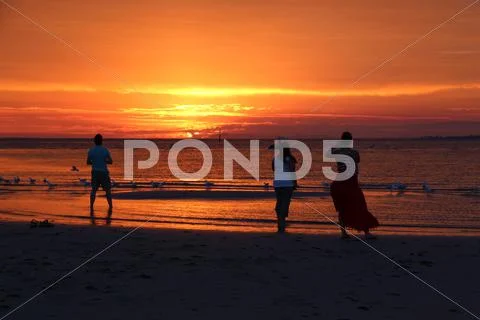 Blood Red Sky by the Seashore