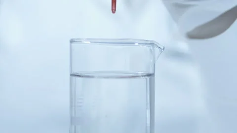 Blood sample is drawn into a glass. Stock Footage 258569358