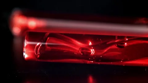 Blood Sample Inside a Glass Test Tube on Dark Background Stock Footage 331101541