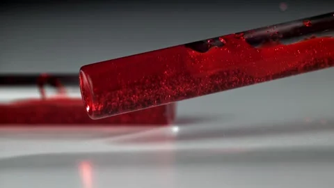 Blood Sample Inside a Glass Test Tube Used in Scientific Laboratory Research Stock Footage 331101634