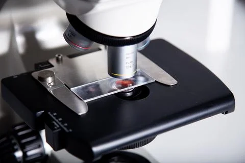 Blood sample, microscope at the medicine and biology laboratory Stock Photos