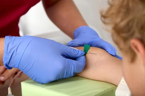 Blood sampling from a child's vein using a vacuum system Stock Photos