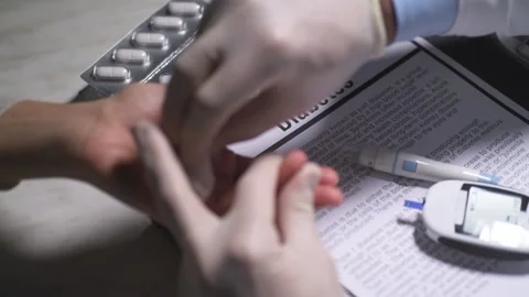 Blood sampling in doctors office. Diabetes test Stock-Footage 166580583