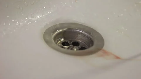 Blood in the sink when brushing your teeth Stock Footage 101953893