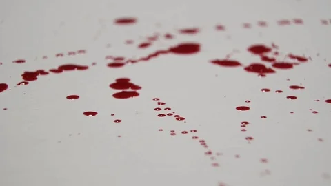 Blood splatters on a white surface. Stock Footage 82900491