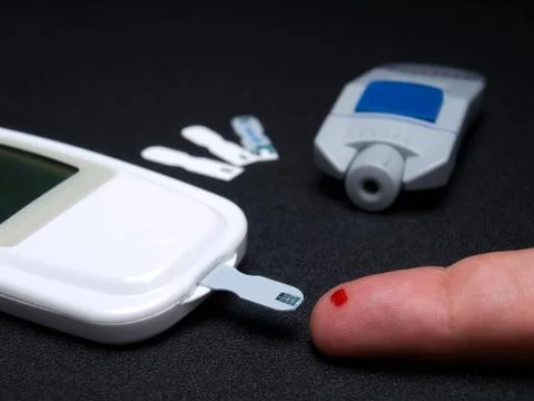 Blood sugar testing Stock Photos