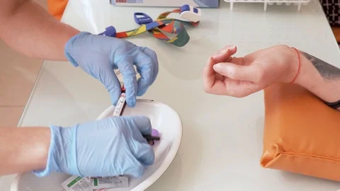 Blood Test Nurse Puting Stickers and Signs Test Tubes With Venous Blood HIV Stock-Footage 114071040