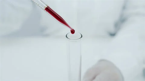 Blood into a test tube. Stock Footage 148721277