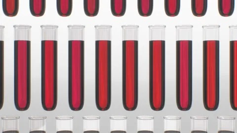 Blood Test Tubes in Space Video stock 130792026