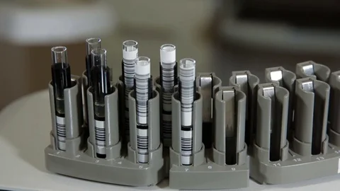 Blood test tubes in a support for analysis Stock Footage 70631469